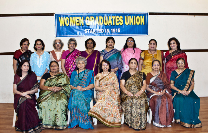 Photograph women executives in sari