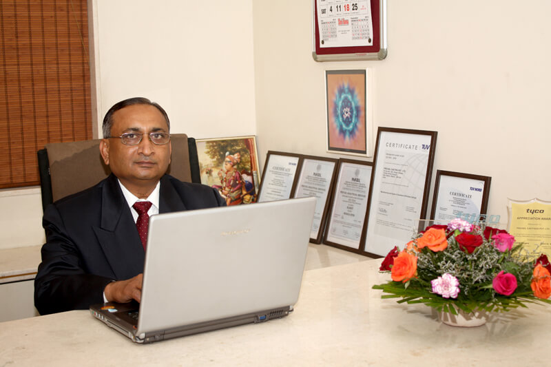 Photograph of an executive on desk in Rajkot