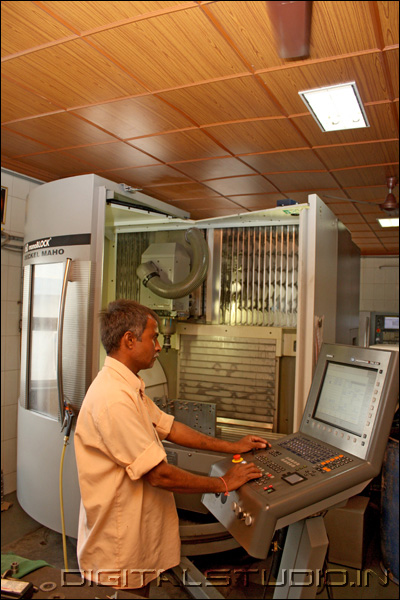 Worker on a CNC machine