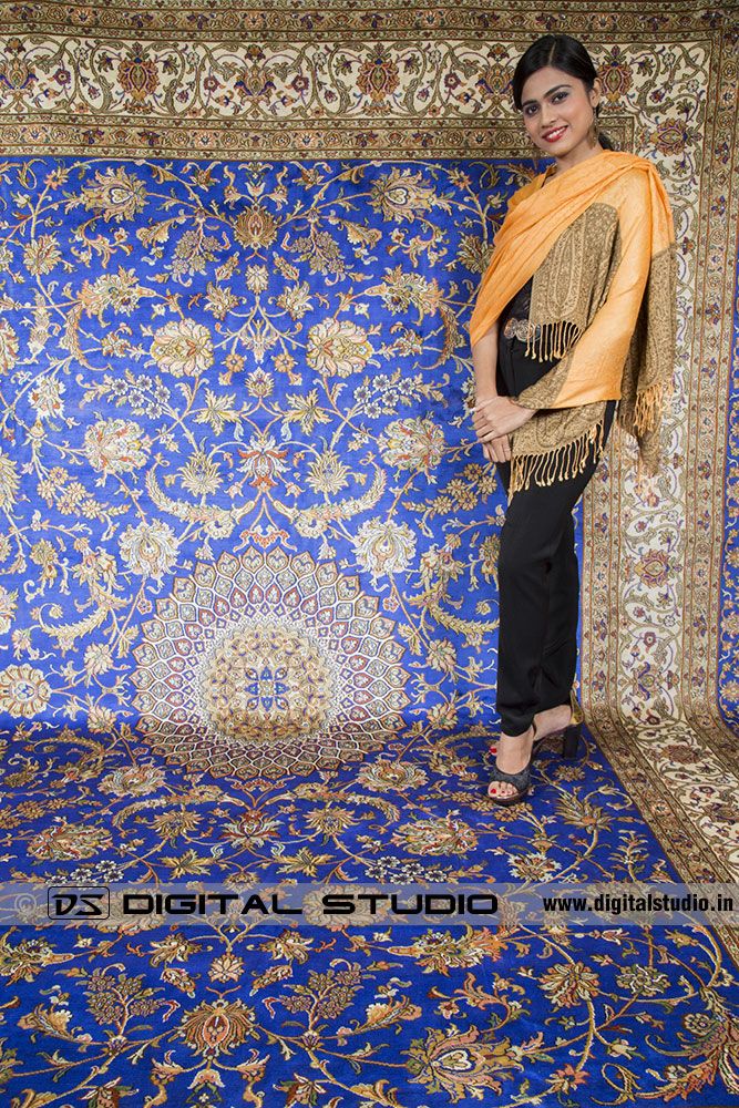 Model standing on Kashmir Silk carpet