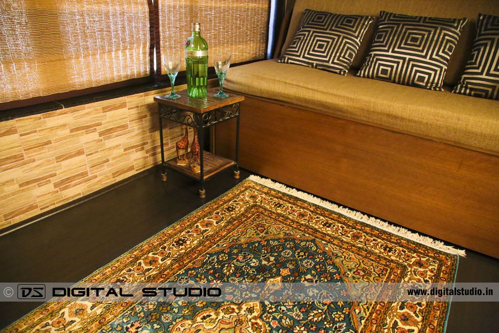 Oriental hand made carpet with wine and glasses setup