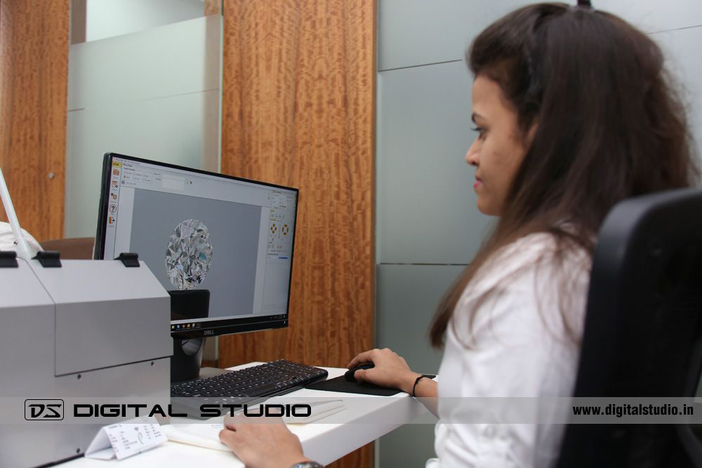 Female working on machine to take video of diamonds