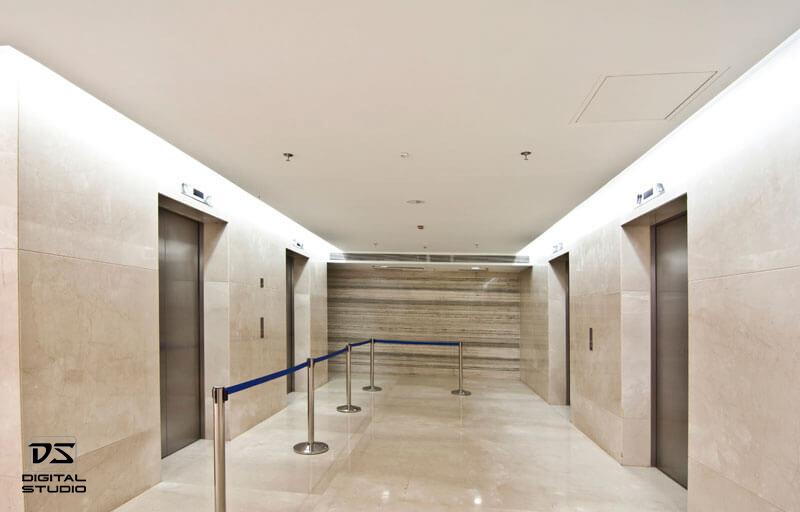 Wide angle photo of four elevators lobby