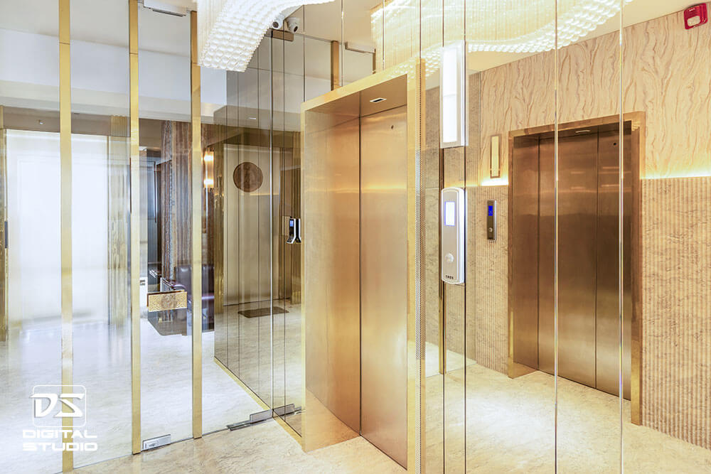 Premium elevator lobby with gold finish