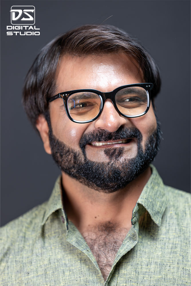 Smiling Model posing in a studio.