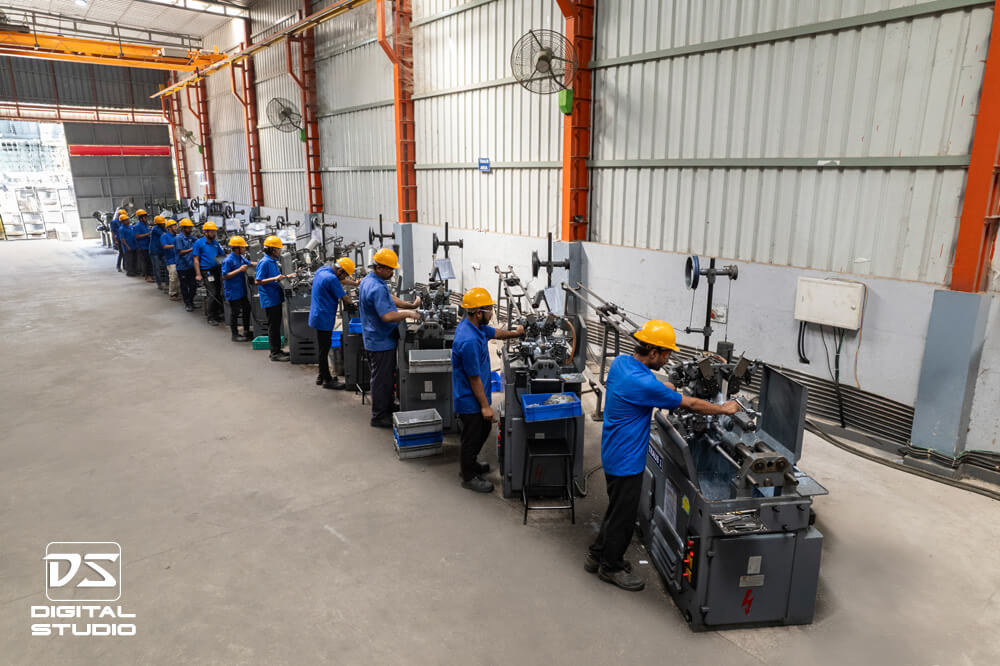 Lineup of workers on Traub machines